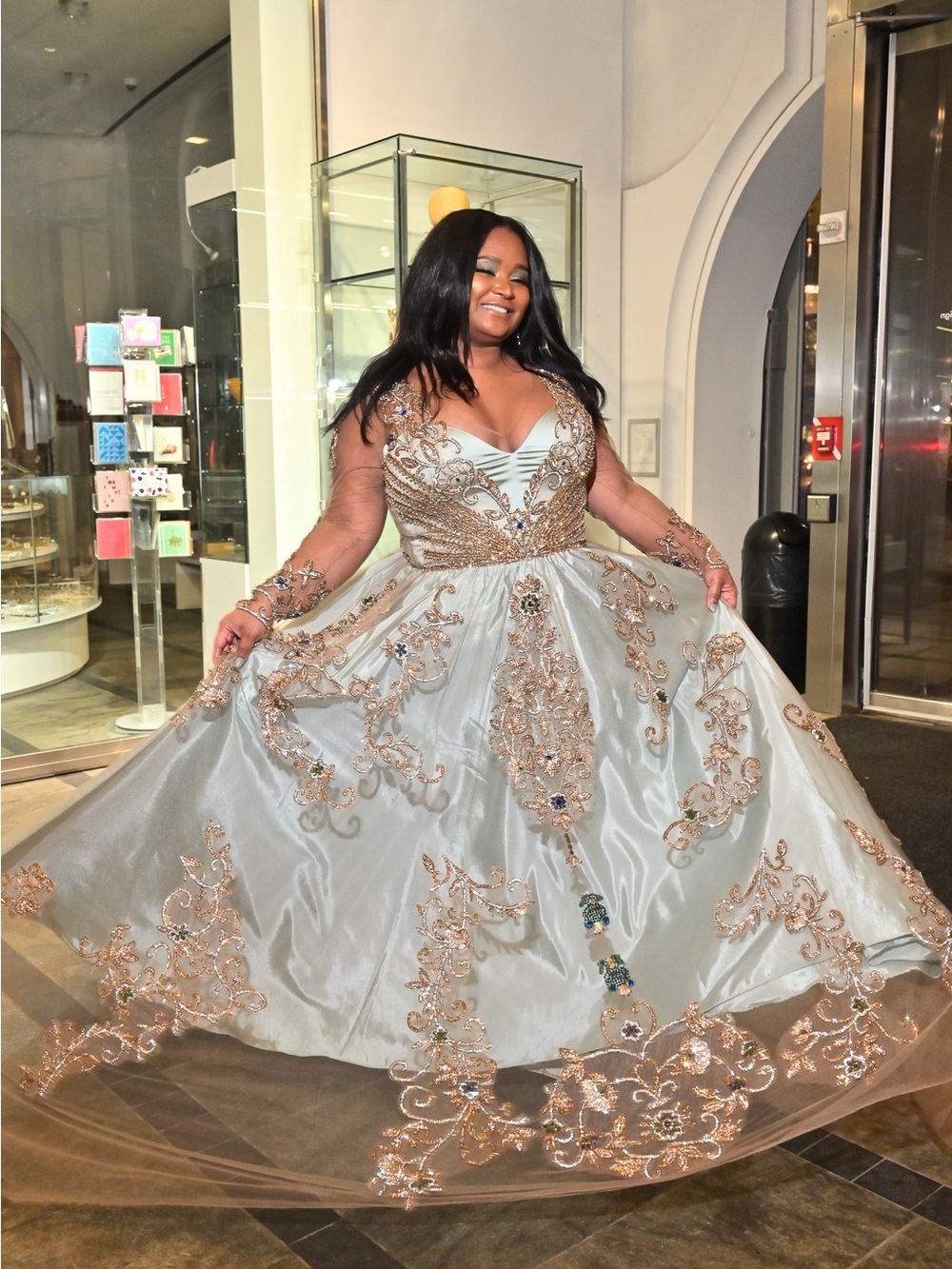 Embellished Light Aqua Ball Gown with Gold Floral Beading.